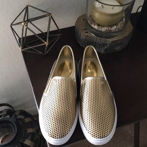 Michael Kors gold Keaton slip on sneakers